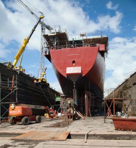 Franna being lowered into No 7 dry dock Cammel Lairds for screw shaft replacement on Navy ship
