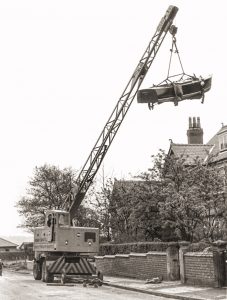 Boat lift from customers garden using 12t Coles crane